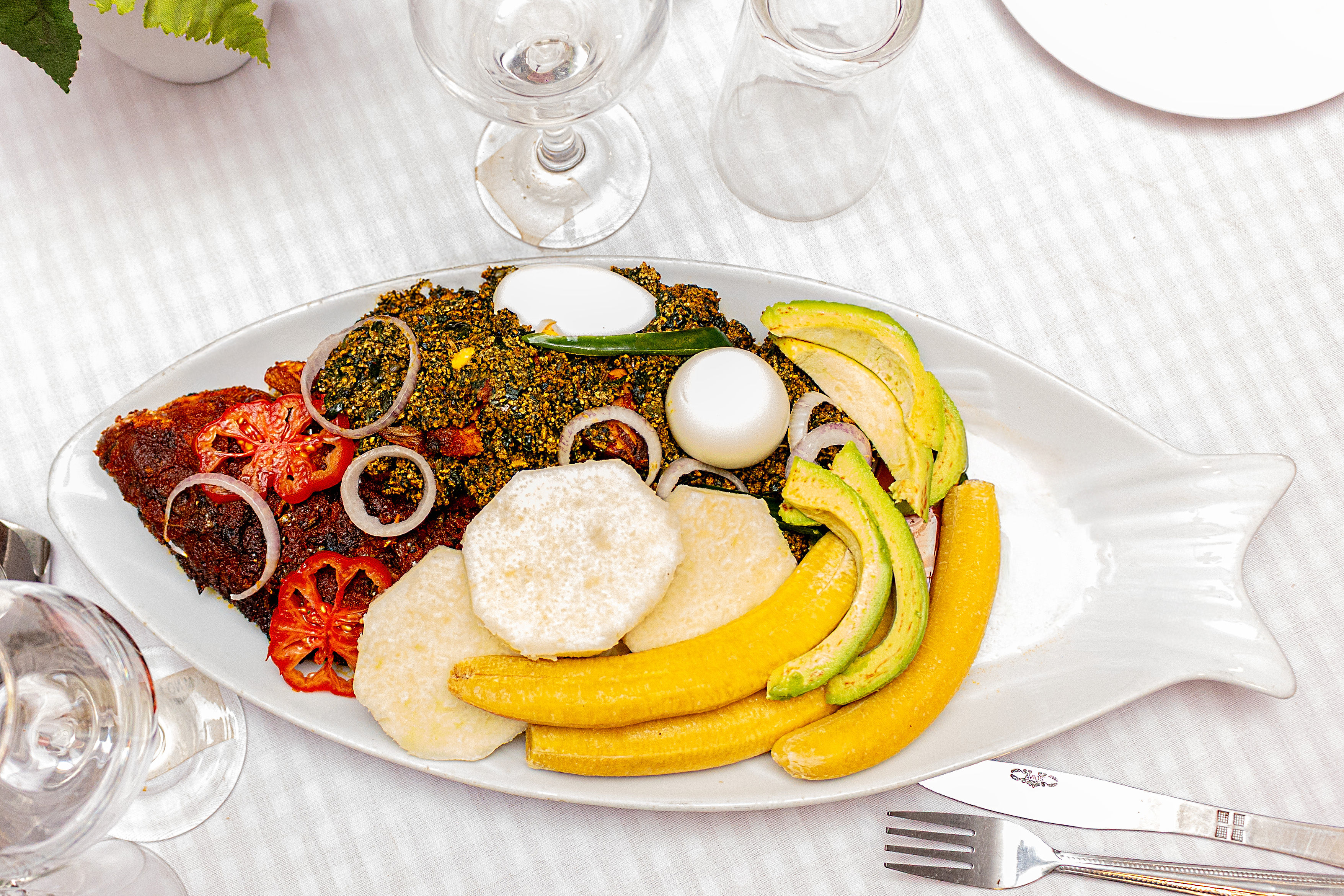 Traditional Ghanaian fish with eggplant and yam